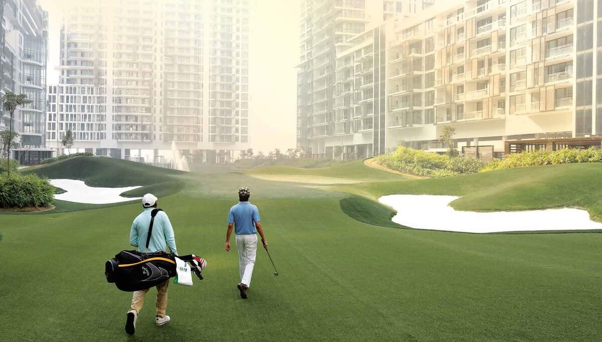 M3M Golfestate Sector 65 Gurugram master site plan showing Fairway West & East towers, golf course, clubhouse and pools