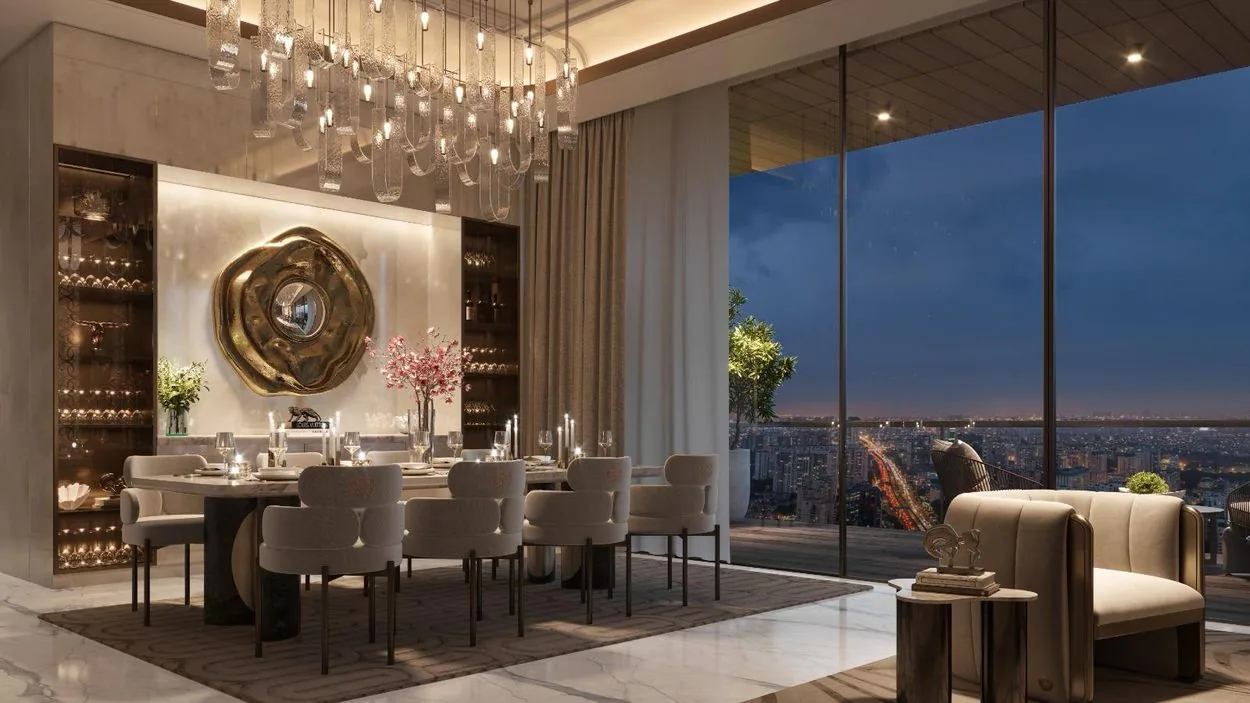 Dining area opening onto the skyline at M3M Elie Saab
