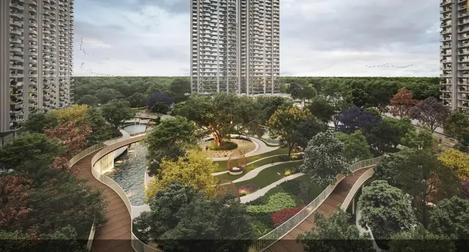 Elevated SkyWalk at the Central Grove, M3M Forestia West, winding above trees and water