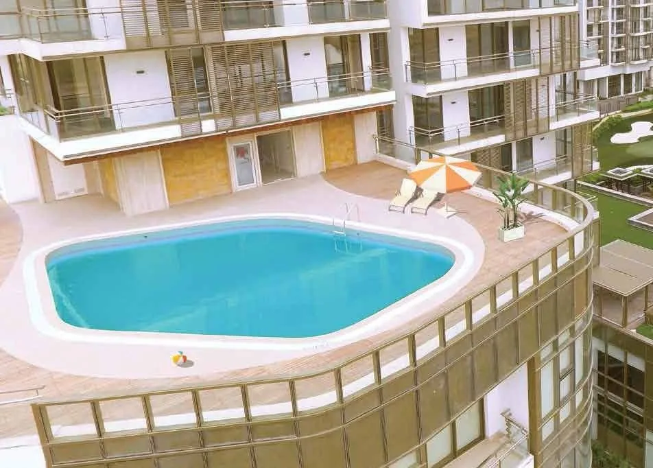 Temperature-controlled rooftop swimming pool at M3M Golf Estate