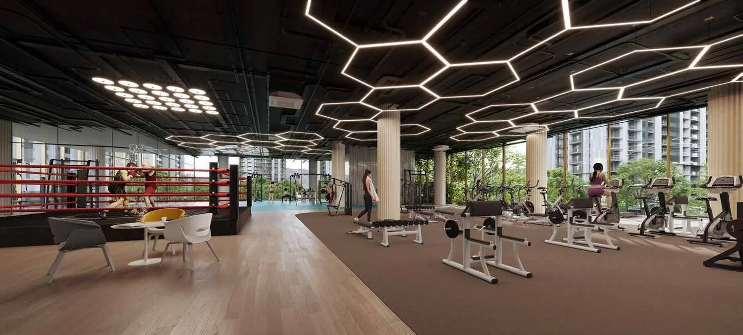 Fitness centre with a boxing ring and gym at M3M Golf Hills