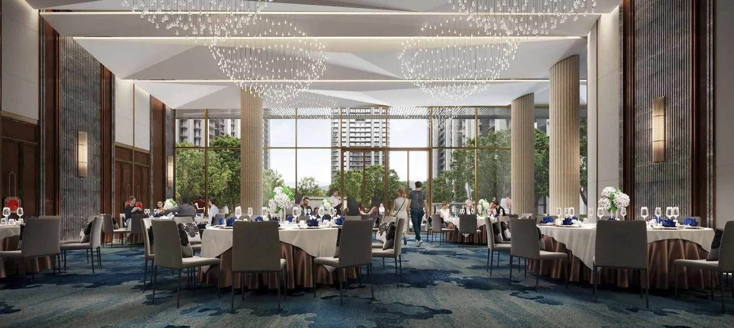 Multi-functional banquet hall with chandeliers at M3M Golf Hills