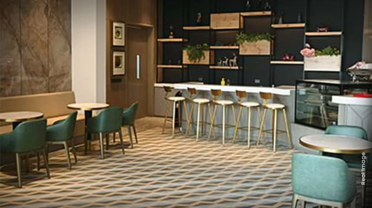 Café seating at the M3M Marina clubhouse in Sector 68, Gurugram