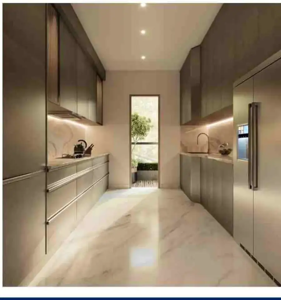 M3M Opus modular kitchen with hob, chimney and international stone finish tile