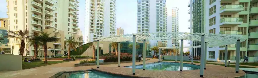 The largest swimming pool in the vicinity at M3M Merlin with timber deck and pergolas