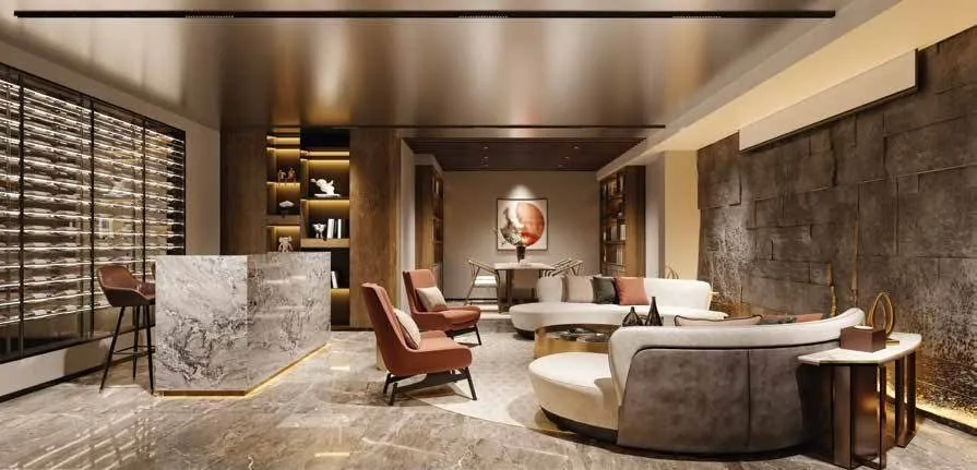 Clubhouse lounge interior with marble and warm lighting at M3M The Cullinan