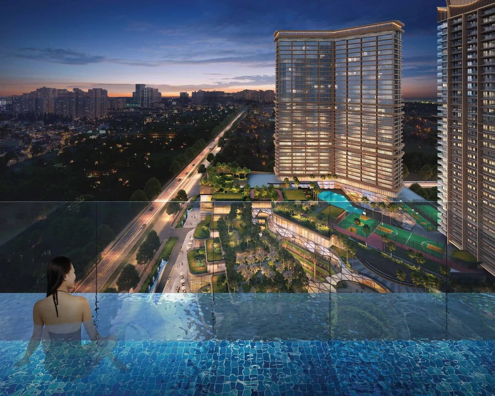 Infinity-edge swimming pool at dusk overlooking the Noida greenbelt at M3M The Cullinan