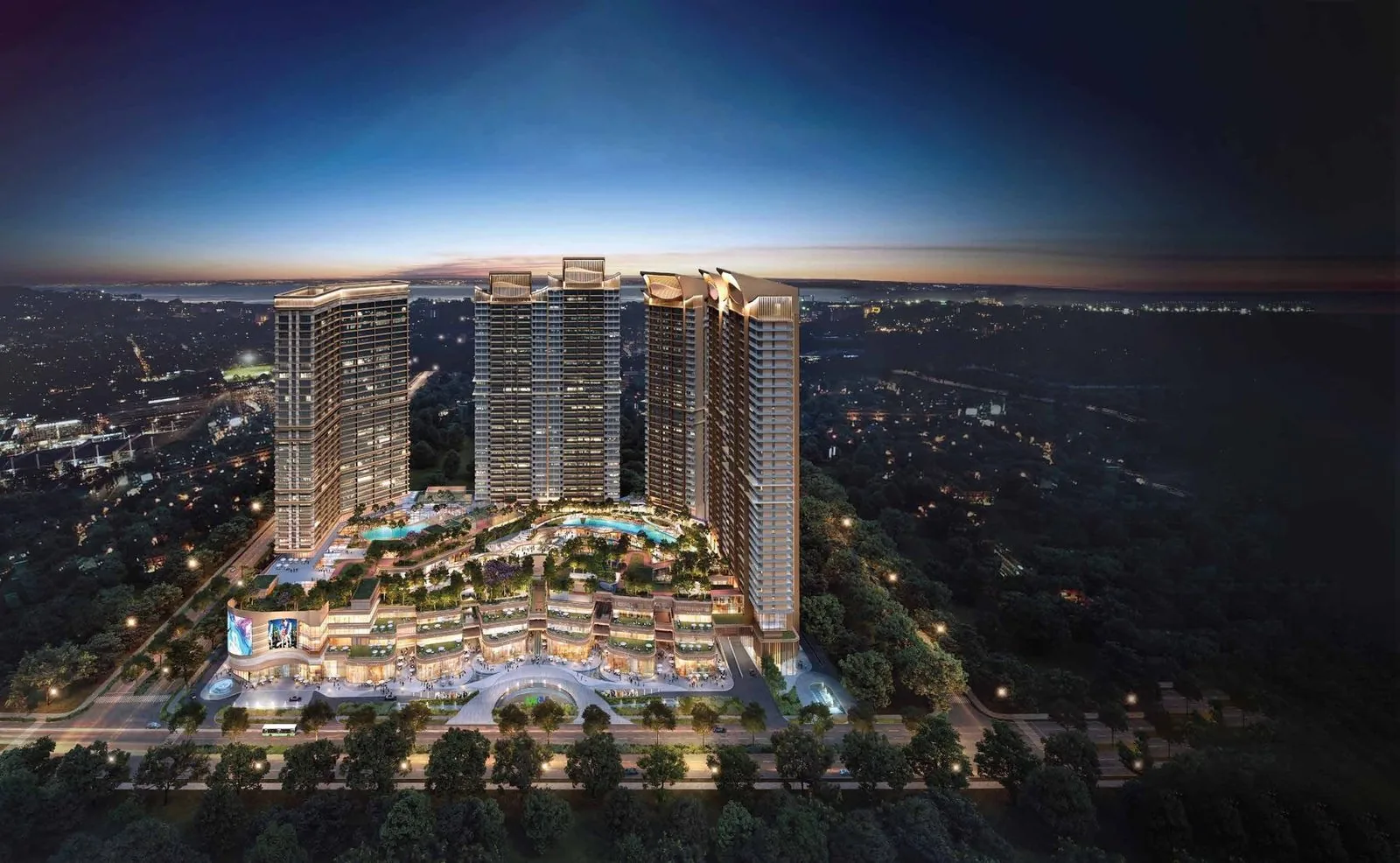 M3M The Cullinan residential towers with illuminated rooftop crowns at night, Sector 94 Noida